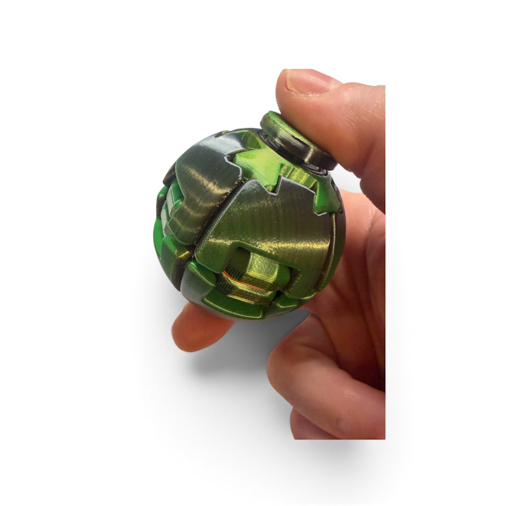SpinSquoosh – Press-to-Spin Fidget Ball