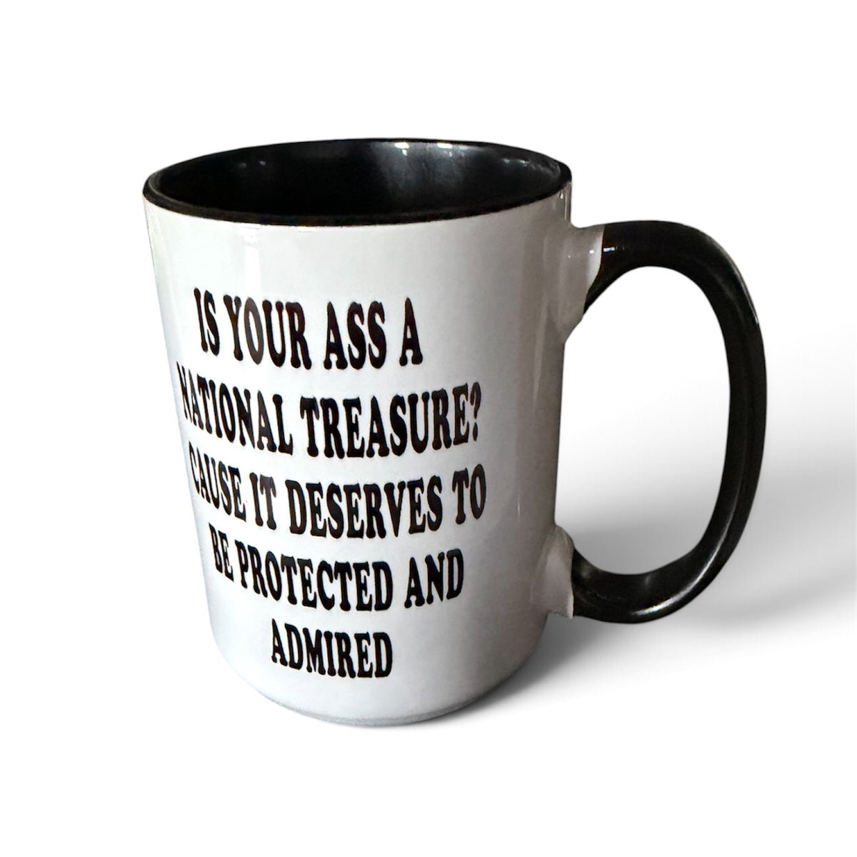 20 oz ceramic novelty mug with black handle and national treasure quote